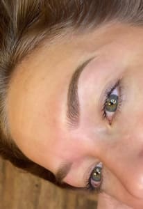 Eyebrow Tattoo result by Adorn Beauty By Amelia in Waveland, MS