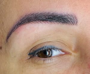 Eyebrow Tattoo result by Alkhuzai Beauty LLC in St Louis, MO