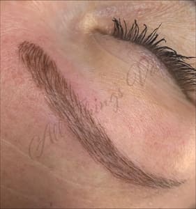 Eyebrow Tattoo result by All Things Vain Medi Spa in Lone Tree, CO