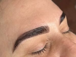 Eyebrow Tattoo result by Amanda Rustmann Custom Eyebrow Designer and Skincare in Tampa, FL