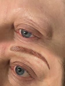 Eyebrow Tattoo result by aRay Stone & Beauty in Richfield, WI