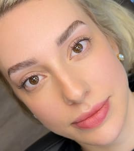 Eyebrow Tattoo result by Artistry Beauty Salon in Houston, TX