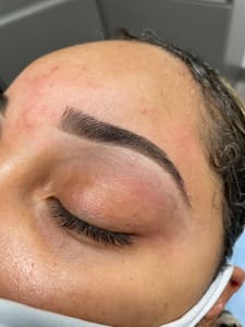 Eyebrow Tattoo result by Ashe Beauty Lounge in Smyrna, GA