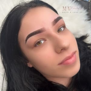 Eyebrow Tattoo result by Aura Glow Artistry in Gunnison, CO
