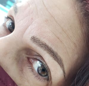 Eyebrow Tattoo result by BaSalle Beauty Studio & Academy in Boynton Beach, FL