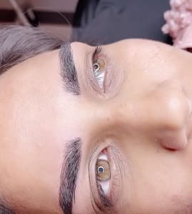 Eyebrow Tattoo result by Beautiful You Permanent Makeup and Microblading in Iowa City, IA