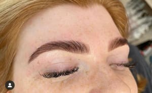Eyebrow Tattoo result by Beyond Beauty Spa & Salon in Mandan, ND
