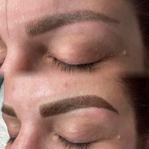 Eyebrow Tattoo result by Bisou Dep Beauty Spa and Academy in Spring, TX