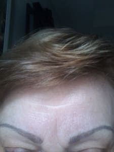 Eyebrow Tattoo result by Bloom Esthetic Skin Care by Sara Kim in Cary, NC