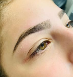 Eyebrow Tattoo result by Blush Beauty Studio in Strasburg, VA