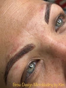 Eyebrow Tattoo result by Brow Design Microblading by Kim in Thibodaux, LA