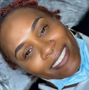 Eyebrow Tattoo result by Brown Bella Beauty - Ombre Brows, Hydrafacial, Threading, Wax, Tint and Advance Skincare Treatments in Columbia, MD