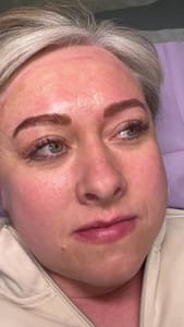 Eyebrow Tattoo result by Charm Beauty Studio LLC in Plymouth, MN