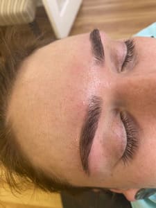 Eyebrow Tattoo result by CHARMING BROWS AND BEAUTY SALON. By Appointment Only in Edgewater, MD