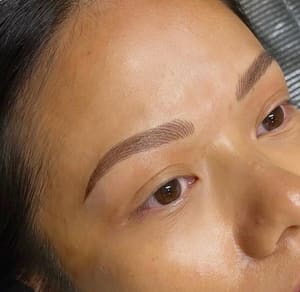 Eyebrow Tattoo result by Chey Beauty Esthetics in Kimberly, WI