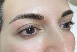 Eyebrow Tattoo result by Coco Beauty Studio in Highland, MD
