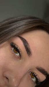 Eyebrow Tattoo result by Elysian Salon & Spa in Rochester, MI