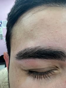 Eyebrow Tattoo result by EXPRESSBROWS 24 (Specialize in Waxing, Sugaring, Eyelashes, Brow lamination, Lash Lift , Microblading, Facials) in New York, NY
