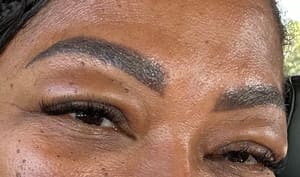 Eyebrow Tattoo result by Ezili Beauty Bar in Lauderhill, FL