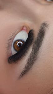 Eyebrow Tattoo result by Feerie Beauty Studio in Houston, TX