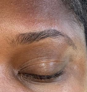 Eyebrow Tattoo result by Glam Look Threading & Salon in Grand Prairie, TX