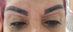 Eyebrow Tattoo result by Gloria's Permanent Makeup & Barber Shop in Tampa, FL