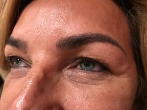 Eyebrow Tattoo result by Julie Nguyen Permanent Makeup Clinic-Microblading-Eyebrow-Microneedling-Microdermabrasion in Kensington, MD