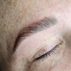 Eyebrow Tattoo result by Junipermoon Esthetics in Wayland, MI