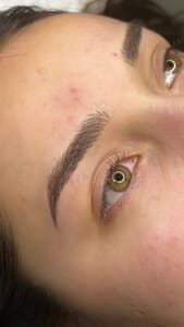 Eyebrow Tattoo result by Kahla Beauty Studio & Academy in Glendale, AZ