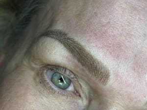 Eyebrow Tattoo result by KD BEAUTY STUDIO ( Inside SOLA SALON) in Austin, TX