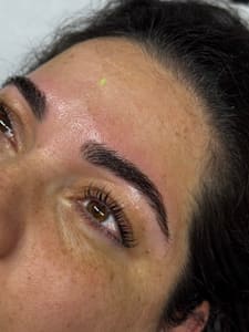 Eyebrow Tattoo result by KNE Beauty & Spa LLC in Okemos, MI