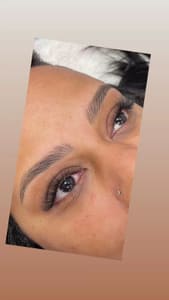 Eyebrow Tattoo result by Lavish Permanent Cosmetics Beauty & Wellness Spa in Bon Air, VA