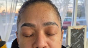 Eyebrow Tattoo result by Looks Threading & Hair Salon in Westbury, NY