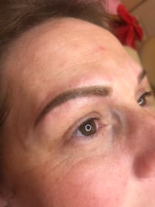 Eyebrow Tattoo result by Luxe Permanent Cosmetics Studio in Aston Township, PA