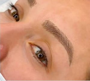 Eyebrow Tattoo result by Maine Stroke Permanent Makeup & Body Piercing in Fallon, NV
