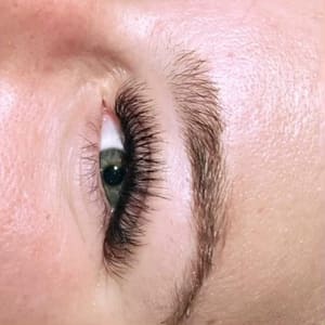 Eyebrow Tattoo result by Marrell Salon + Spa in Van Alstyne, TX