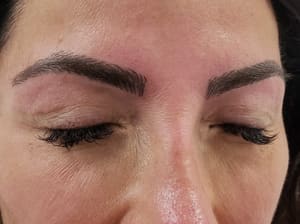 Eyebrow Tattoo result by Millie's All About You Salon Spa in Whitestone, NY