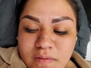 Eyebrow Tattoo result by Molavish Beauty Ink in Laurel, MD