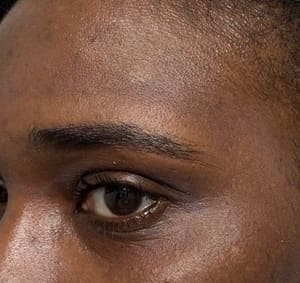 Eyebrow Tattoo result by Monica’s eyebrow Threading Salon (Specialize in Wax, Eyelashes, lamination, Lash Lift , Microblading, Facials) in Brooklyn, NY