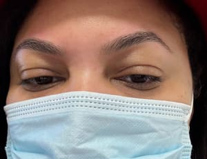 Eyebrow Tattoo result by Munaz Threading Salon & Spa in Allen, TX