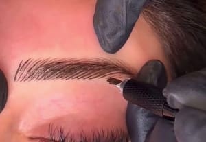Eyebrow Tattoo result by NC Beauty Bar in Milwaukee, WI