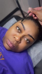 Eyebrow Tattoo result by Noirélan Beauty Studio in Dallas, TX
