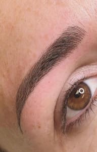 Eyebrow Tattoo result by Nuha Luxe Beauty in Arlington Heights, IL
