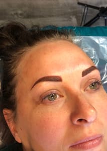 Eyebrow Tattoo result by OneSeven Hair & Permanent Cosmetics in Columbia, MO