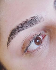 Eyebrow Tattoo result by Pamper Parlour Beauty Salon in Glendale, CA