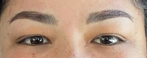 Eyebrow Tattoo result by Perfect 10 Beauty Bar in The Woodlands, TX