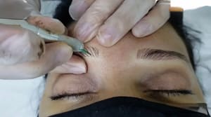 Eyebrow Tattoo result by Permanent Secrets: Permanent Makeup, Eyelash Extensions, & Eyebrow Design in Sunny Isles Beach, FL