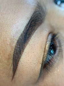 Eyebrow Tattoo result by PoomNita Microblading & Lash in Plano, TX