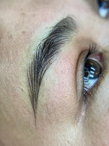 Eyebrow Tattoo result by PoomNita Microblading & Lash in Plano, TX