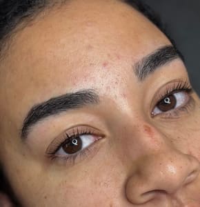 Eyebrow Tattoo result by Powder and Mist Permanent Make Up & Esthetics in Fayetteville, NC